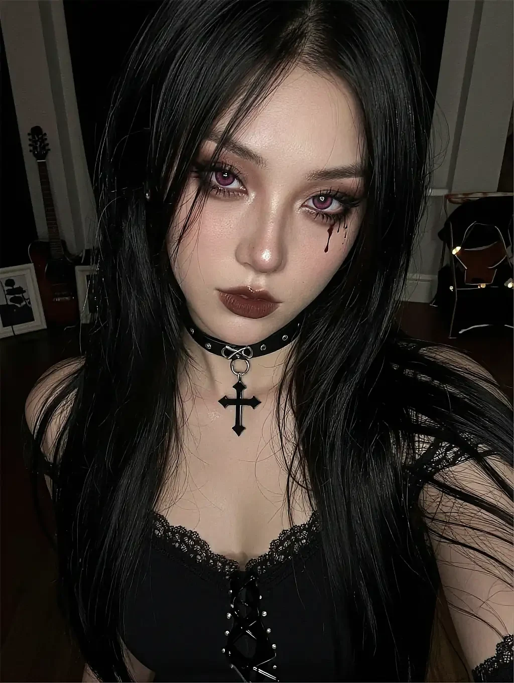 Fictional AI character with long black hair, smudged dark makeup and a cross choker in a black lace top